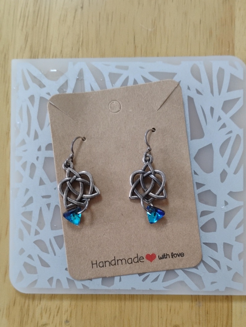 Silver Celtic Knot Earrings with Blue Accents